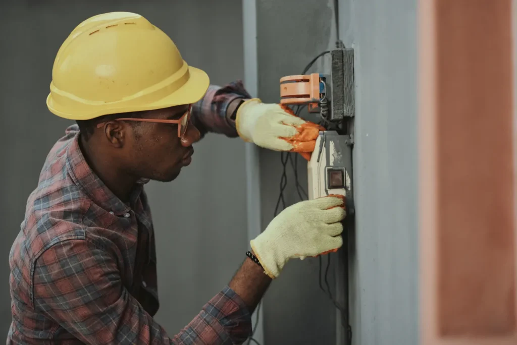 TotalFix technician performing HVAC and appliance repair in UAE